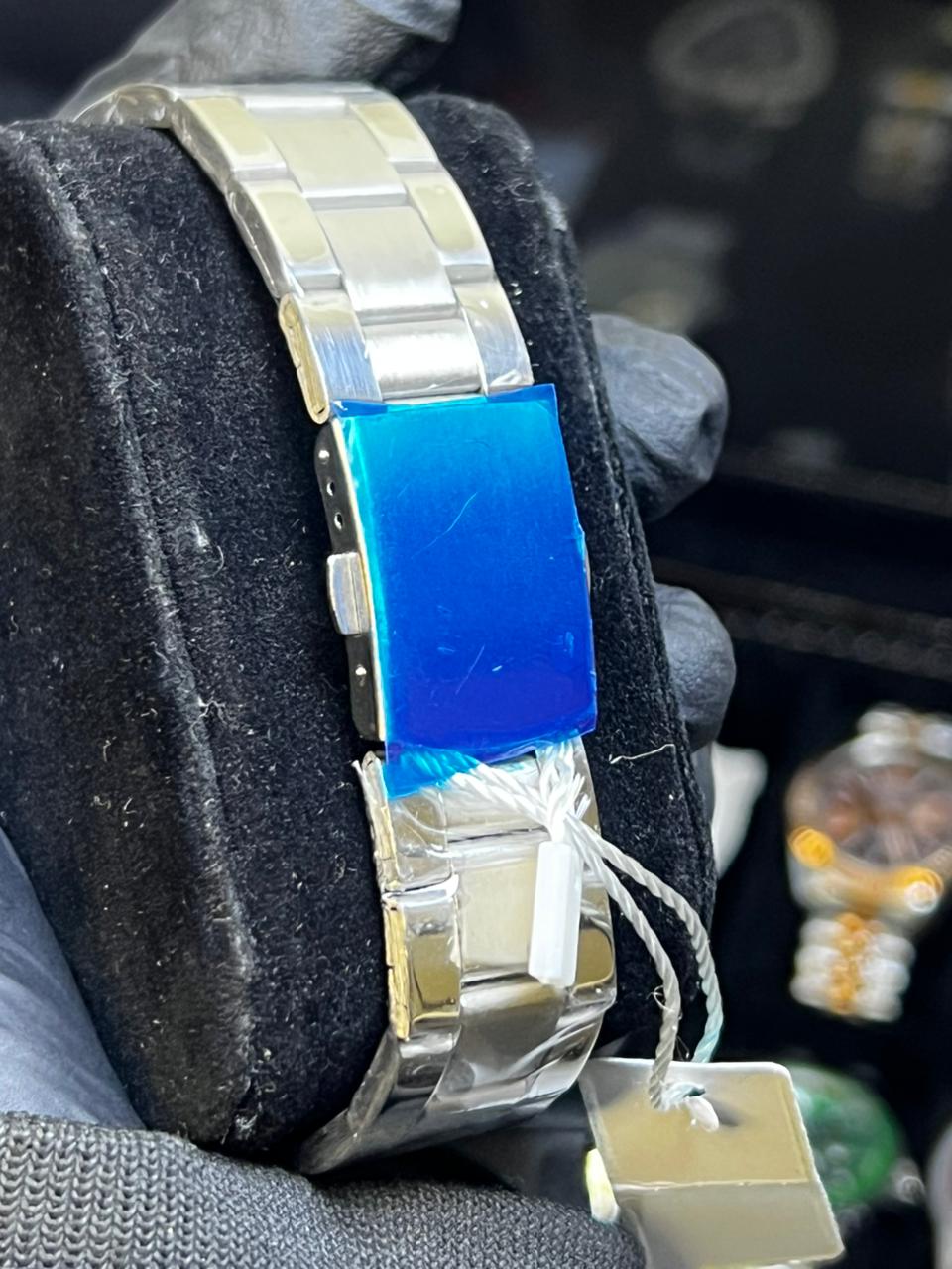 GMT style men’s stainless steel watch with green dial and green bezel